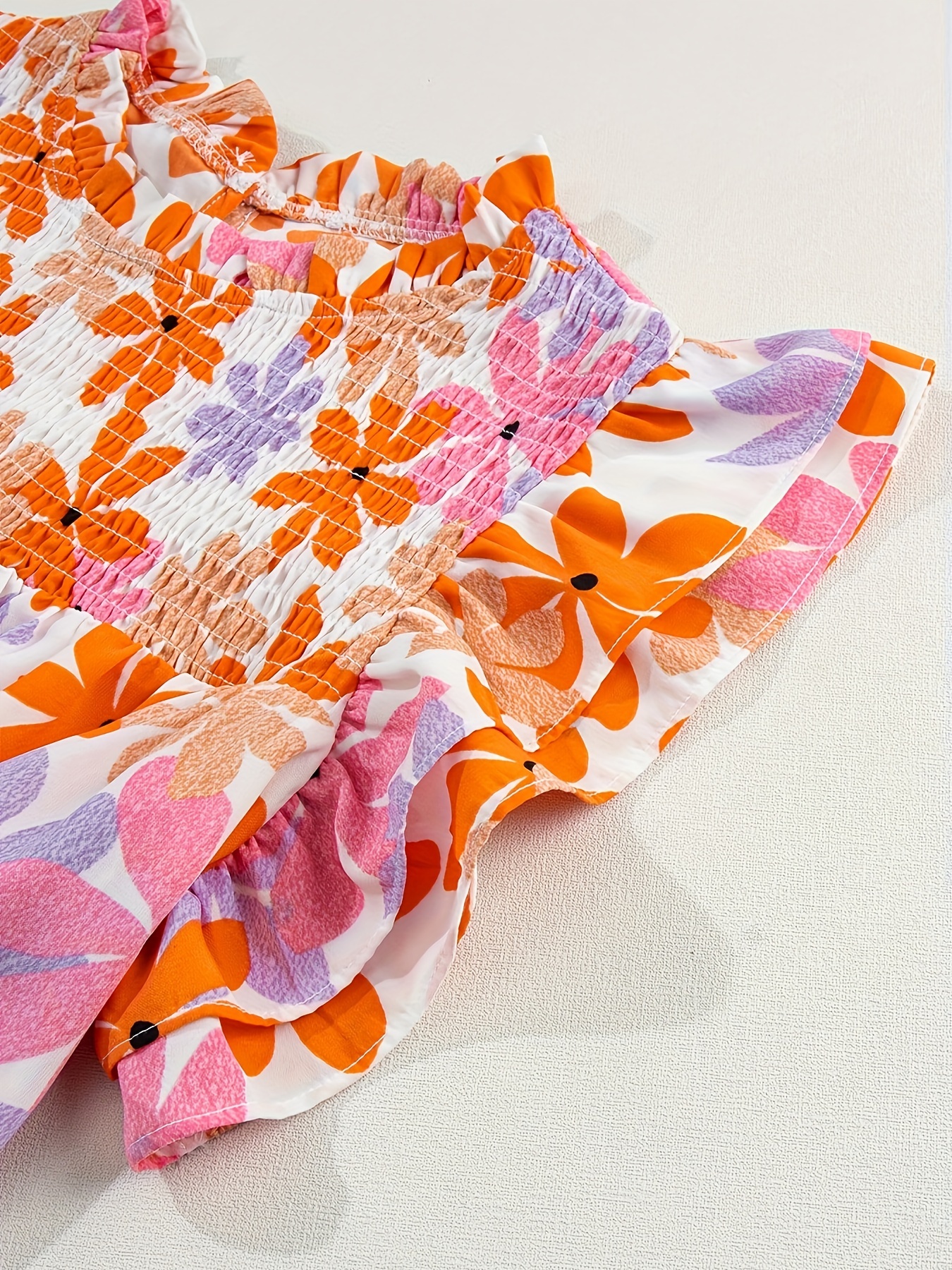 orange   sleeve smocked floral top details 0